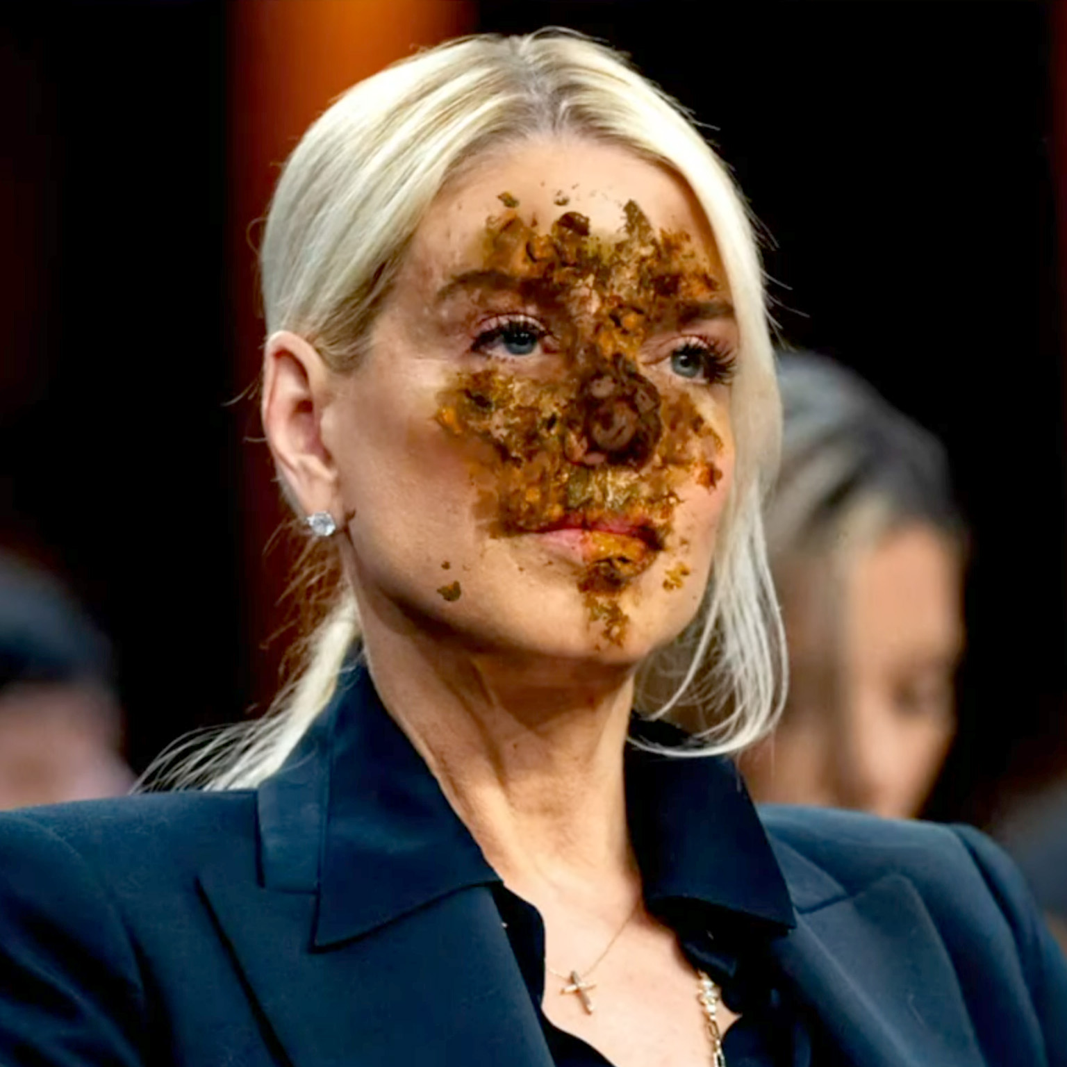 image of Pam Bondi, the United States Attorney General with shit on her nose and face from shoving herself far, far up Trump's ass mulitple times daily, she should be in jail
